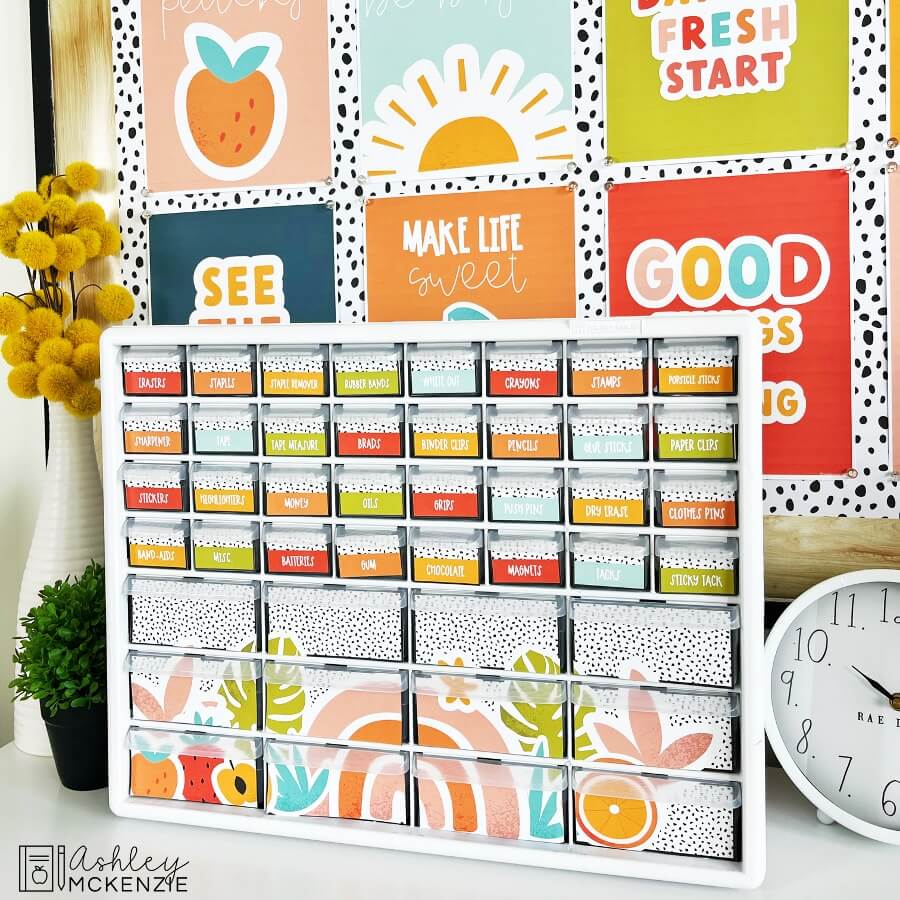 Bright and cheerful teacher toolbox labels are used to decorate a must-have teacher organizing tool. 