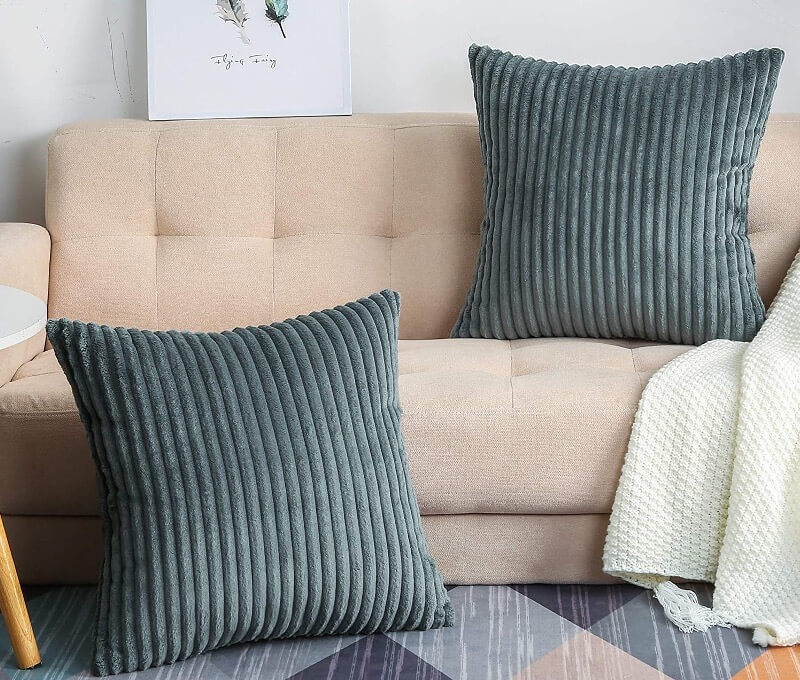 Corduroy throw pillows are featured that work great for a classroom reading corner.