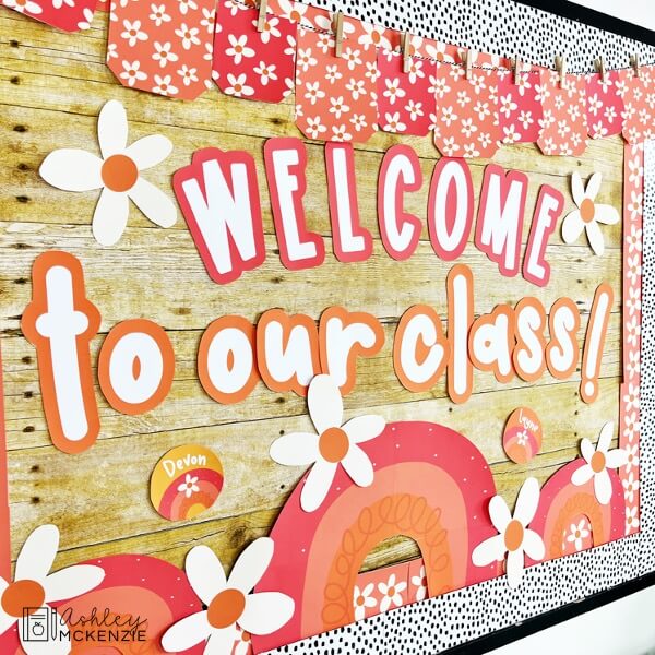 Daisy themed back to school classroom decor featuring reds, oranges, and daisy images.