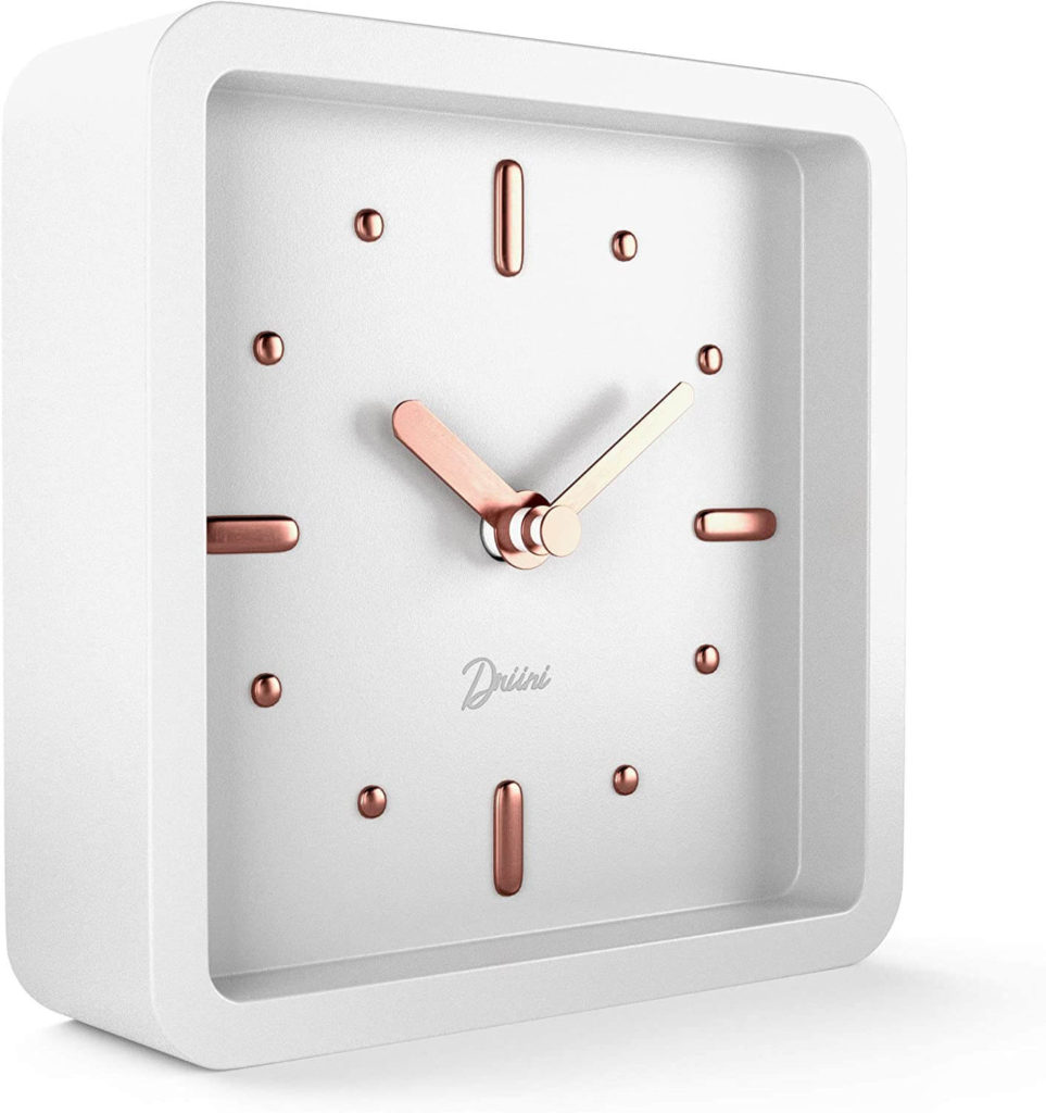 Modern desk clock with rose gold accents.