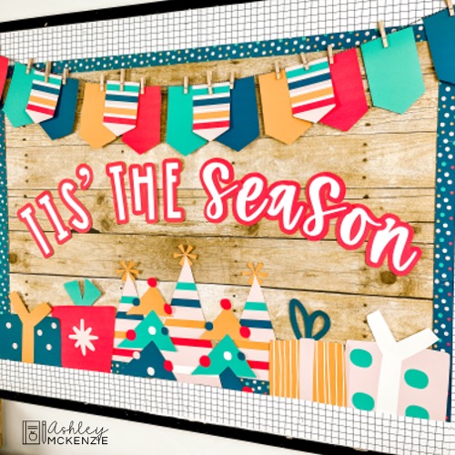 A festive Christmas bulletin board featuring the saying "Tis' the Season." Board decor includes presents, Christmas trees, and colorful banners.