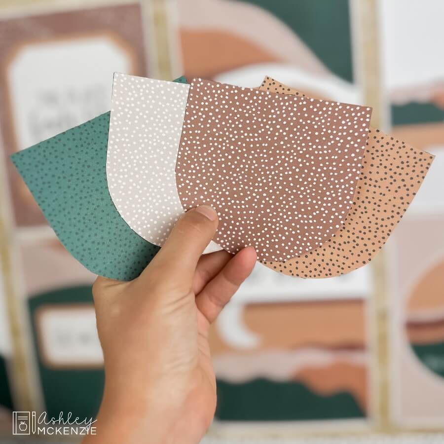 Decorative banners for bulletin boards in jewel tones with a speckled design