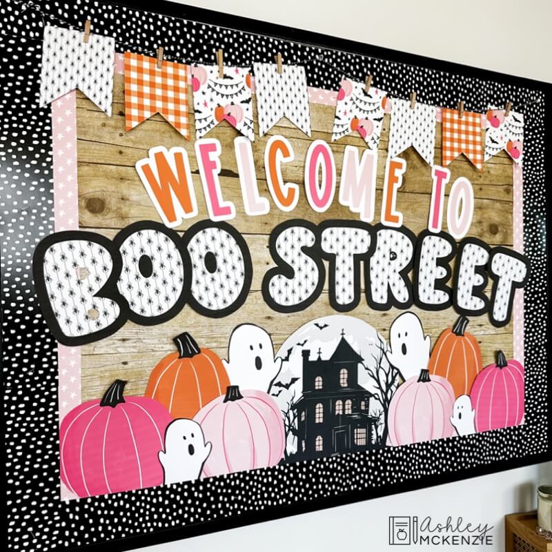 A classroom bulletin board decorated with Halloween classroom decor - the saying Welcome to Boo Street is displayed