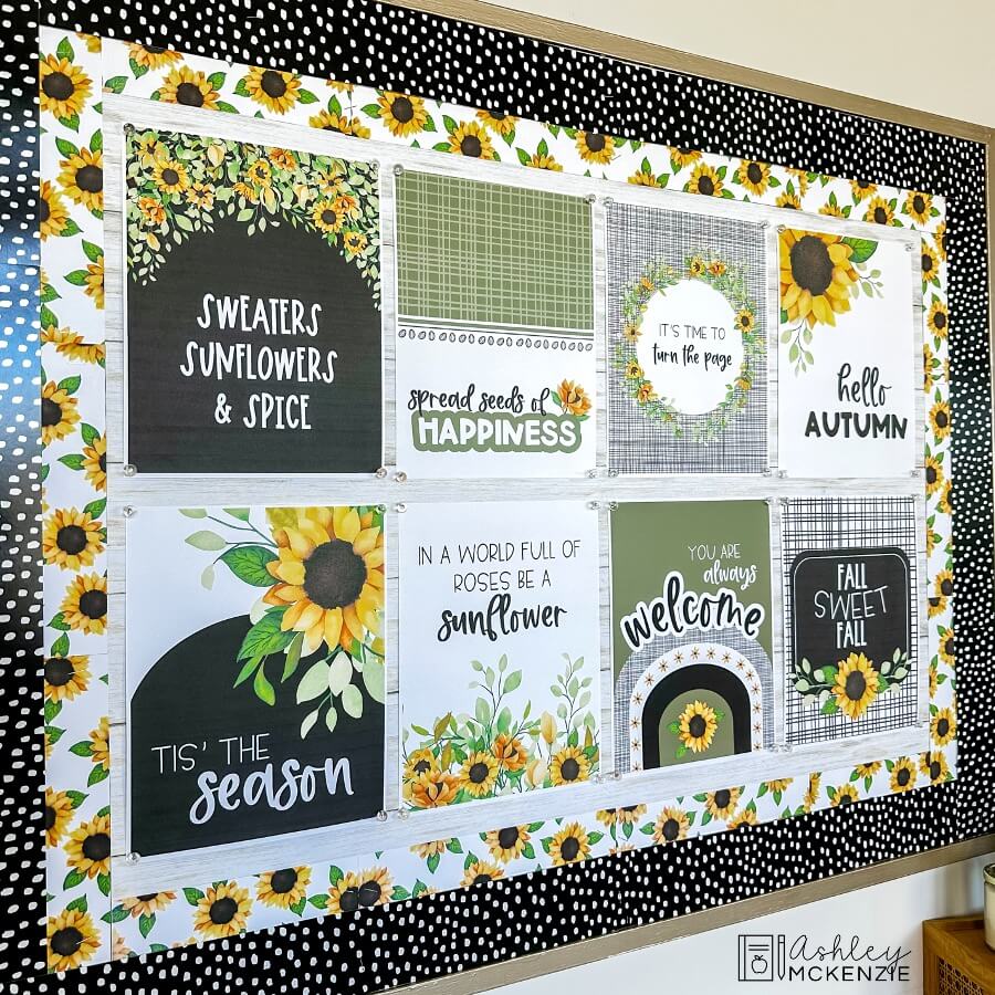 A classroom bulletin board decorated with 8 unique classroom posters featuring a fall sunflowers theme and inspirational fall quotes.