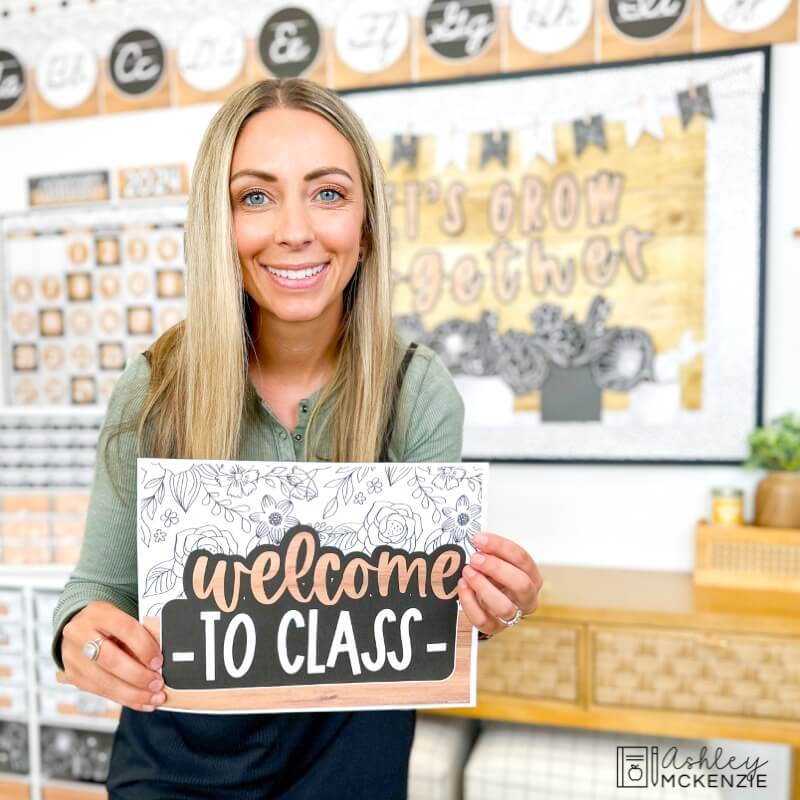 Free classroom welcome signs featuring a black and white design with floral details