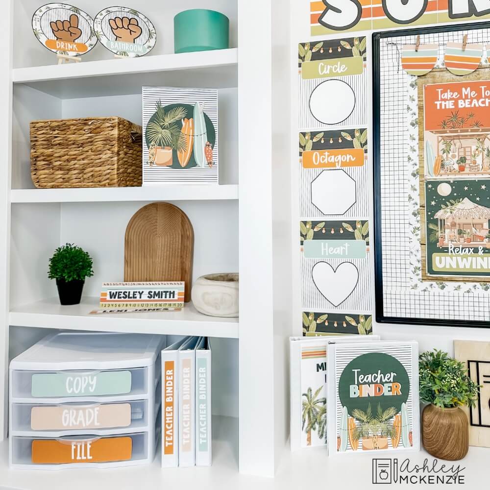 A classroom shelf displaying a variety of beach themed classroom decor items including shape posters, hand signal signs, organizing labels, and more.