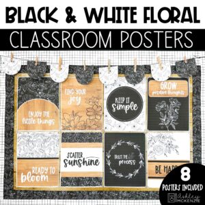 A classroom bulletin board decorated with matching black and white classroom posters featuring delicate floral patterns and wood grain accents