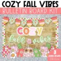 A fall bulletin board kit is displayed in a classroom featuring warm colors and groovy pumpkin designs