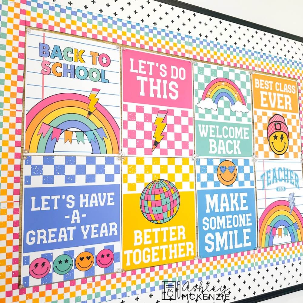 A classroom bulletin board is decorated with 8 colorful back to school posters with positive and welcoming sayings