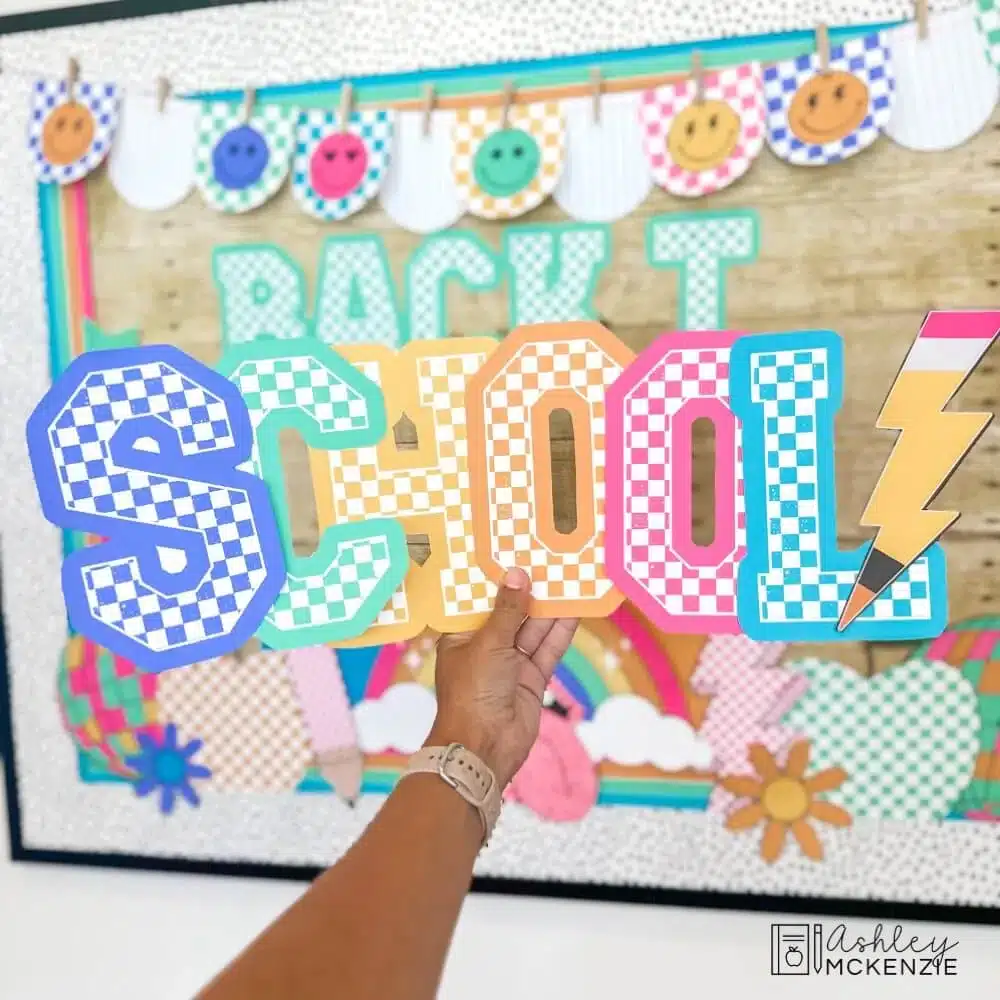 Large bulletin board letter cutouts are shown spelling the word "school" in bright colored designs with checkered patterns