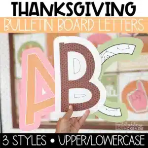 Football and Thanksgiving bulletin board letters are held in front of a classroom bulletin board