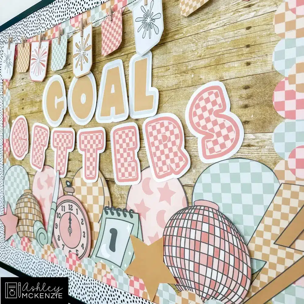 New Year bulletin board ideas featuring soothing colors, celebratory decor cutouts, and the saying "Goal Getters"