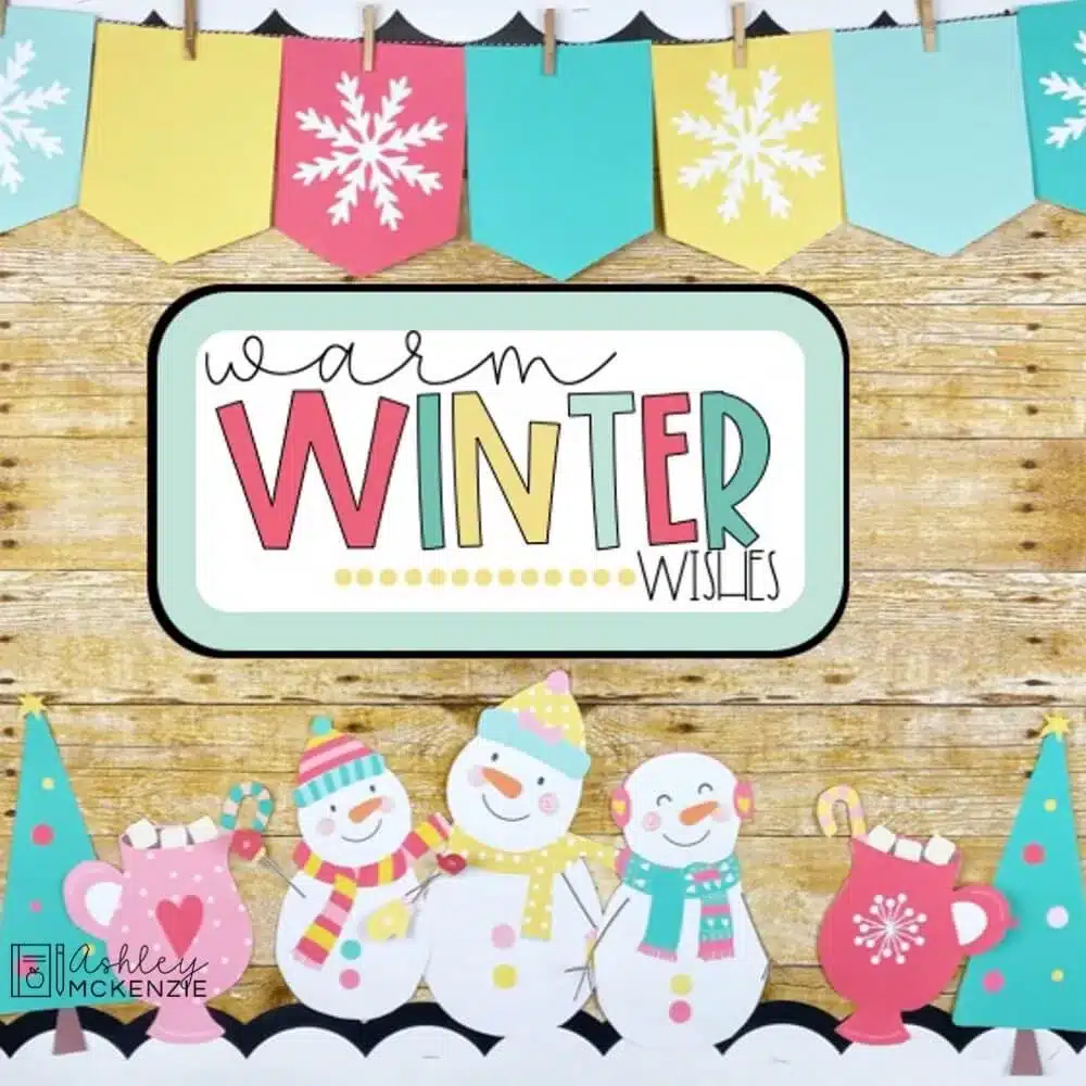 A classroom bulletin board decorated for winter with snowman cutouts, a colorful banner with prints of snowflakes, and a sign that reads "Warm Winter Wishes."