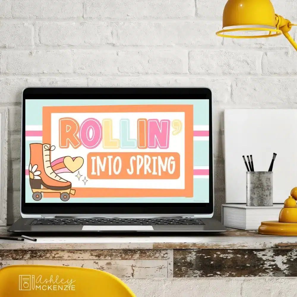 A laptop displays a spring slides template with the greeting "Rollin' into spring" shown on the screen