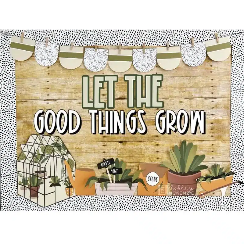 A classroom display featuring a garden theme for spring that says "Let the Good Things Grow"