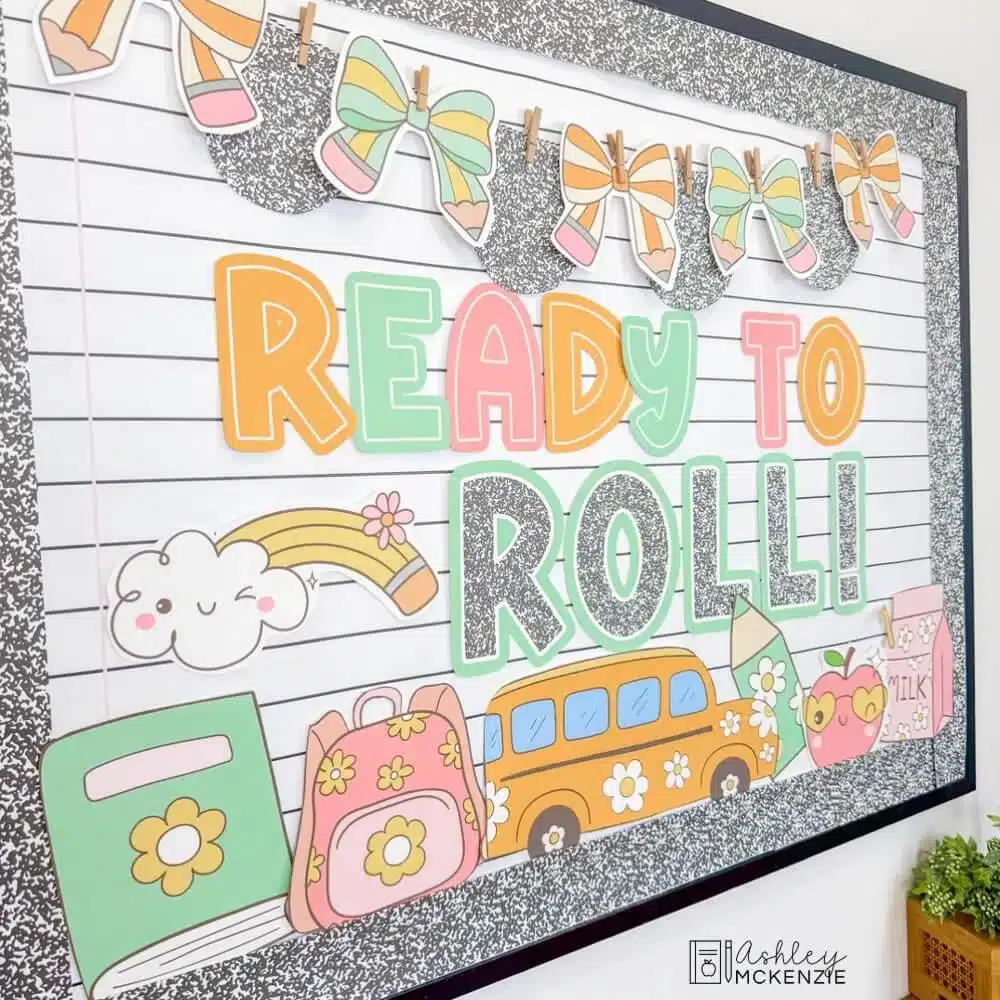 Back to school bulletin board kit featuring colorful school supplies, a school bus, and more with the saying "Ready to Roll"