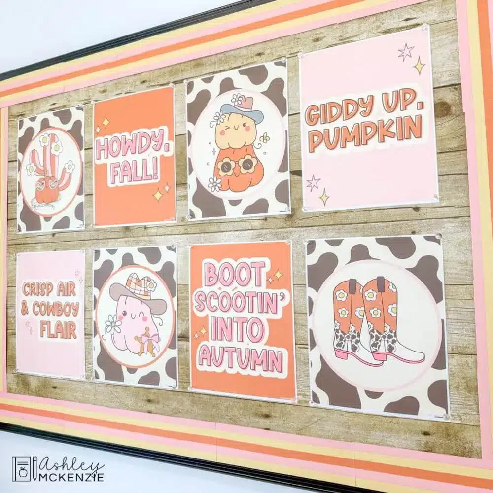 A fall bulletin board is decorated with Western classroom themed posters with fun fall sayings and cute images.