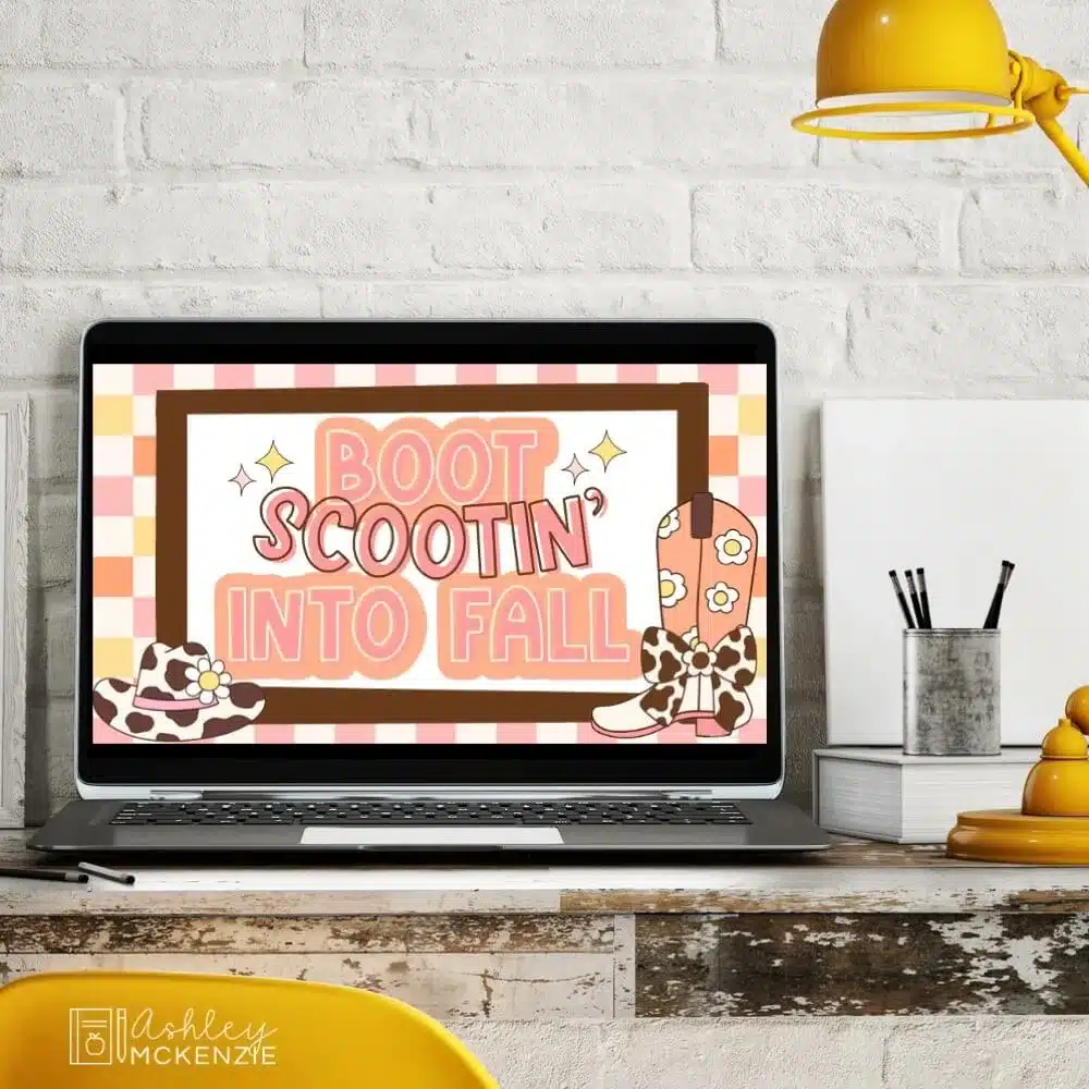 A classroom desktop computer is displaying fall Google Slides templates featuring the saying "Boot Scootin' into Fall."