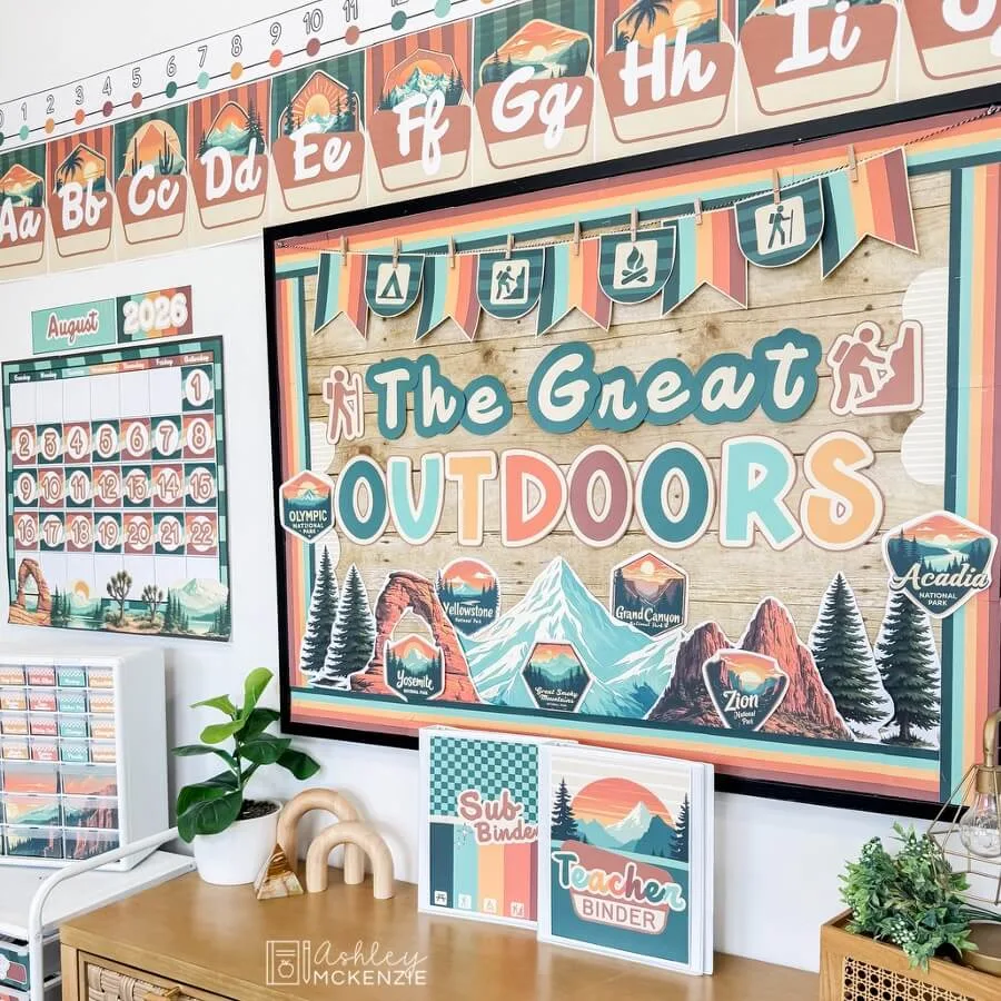 National parks classroom decor for the adventure theme classroom featuring nature inspired designs; a bulletin board with the saying "The Great Outdoors" is displayed