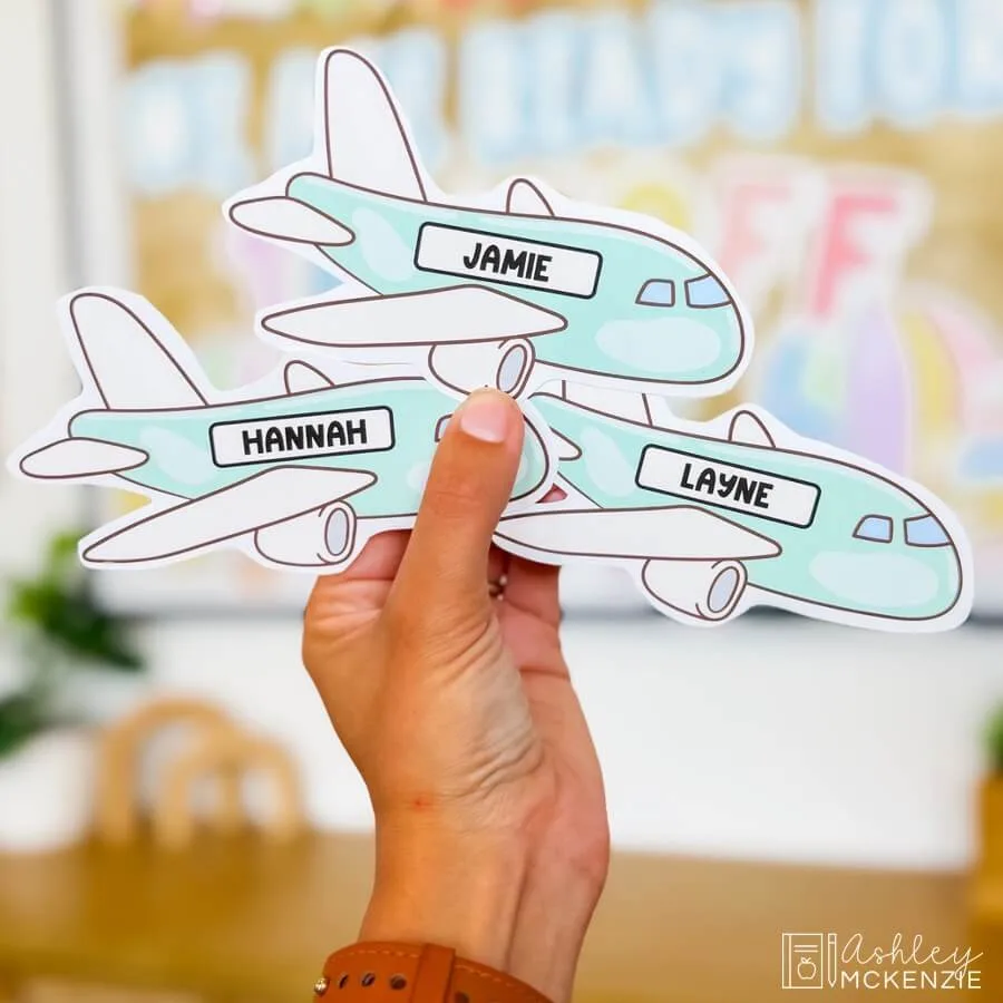 Airplane cutouts with student names for welcome back September bulletin board ideas