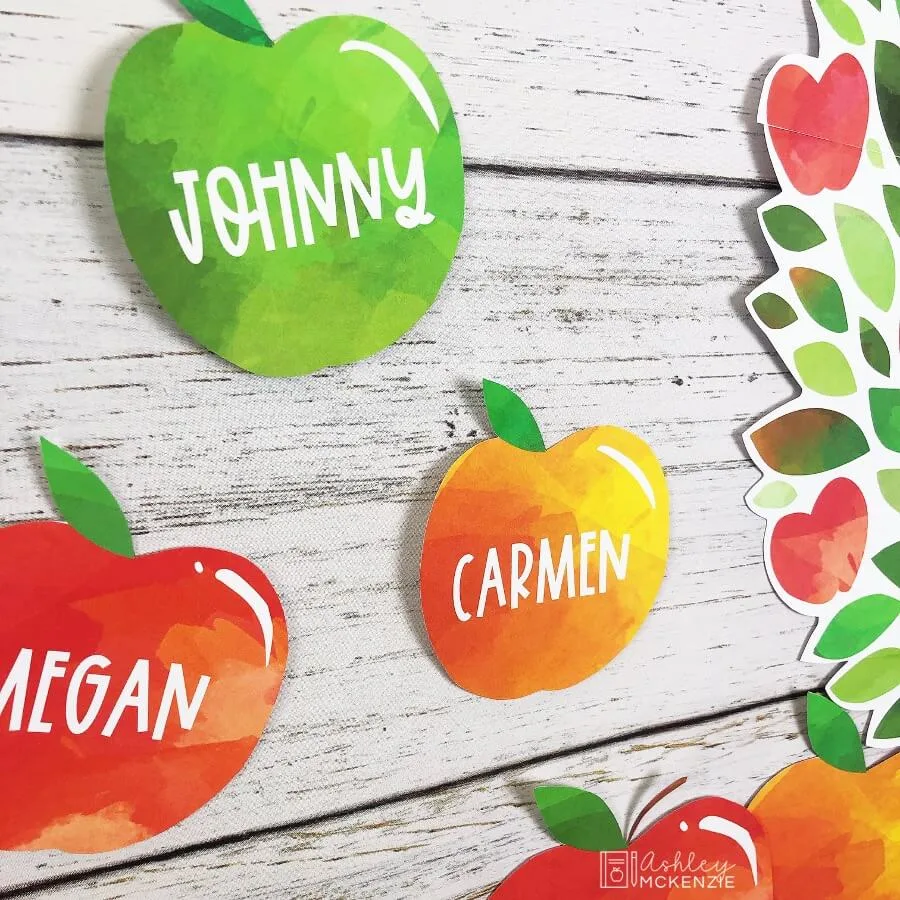 Apple classroom ideas featuring putting student names on apple cutouts for displays
