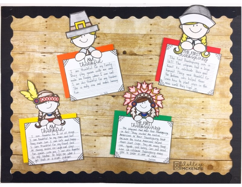 A bulletin board featuring Thanksgiving writing crafts as a student work display